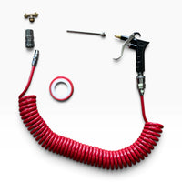 Air seat blow gun kit components: red coil hose, blow gun, brass T-fitting, quick-connect coupler, nozzle extension and thread-seal tape