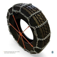 Tire chain fitted on a tire with an orange spider bungee, noted as not included