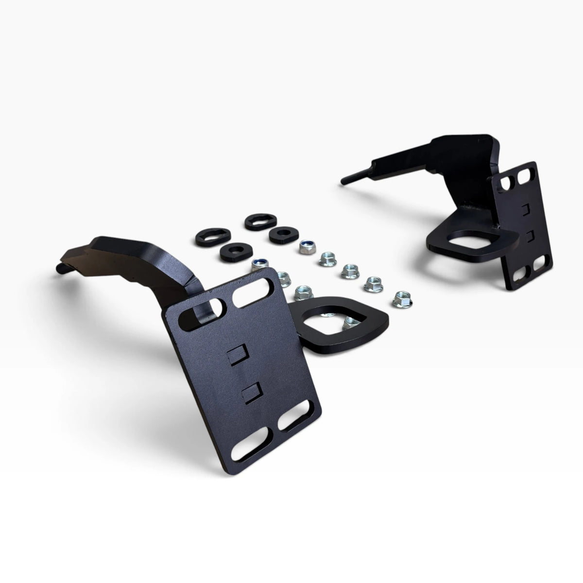 Cascadia deer guard bracket pair at an angle: the arms that slide into the tow-hook receivers and the mounting plates