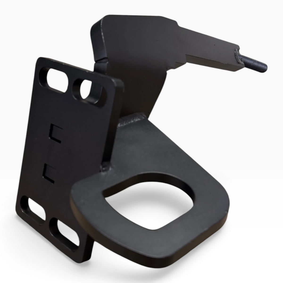 Close-up of a Cascadia deer guard bracket: the towing eye below the mounting plate