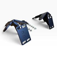 Cascadia 2026+ deer guard bracket pair at an angle: the mounting plates with their slotted holes and the towing eyes above