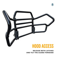 Deer guard from behind at an angle, showing the two posts it hinges on to tilt forward for hood access