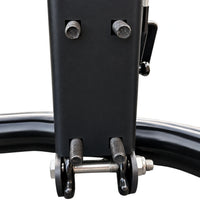 Foot of a deer guard mounting post: two threaded studs and the hinge pin