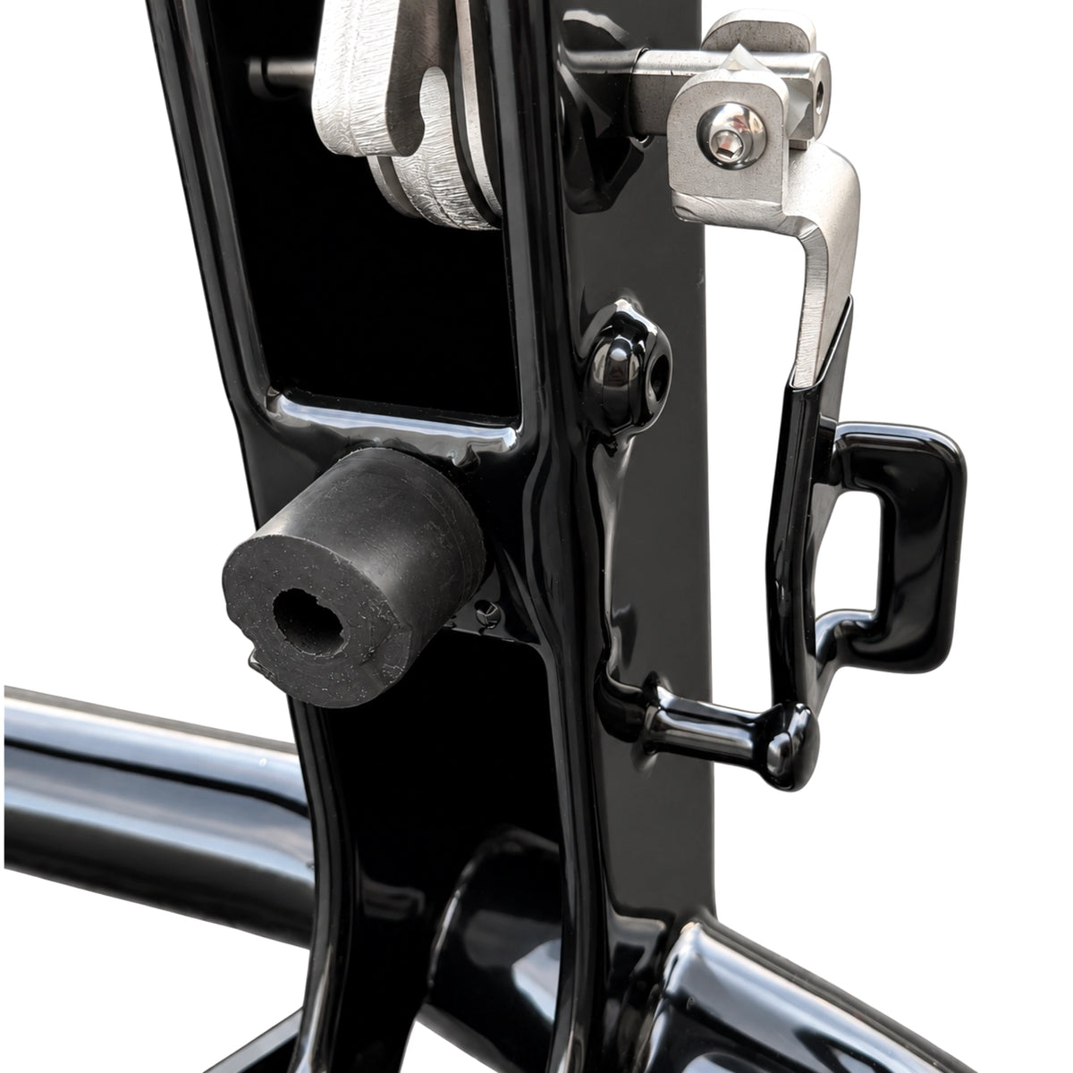 Close-up of the latch handle and rubber stop on a deer guard mounting post