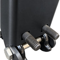 Close-up of the threaded studs and hinge pin at the foot of a deer guard post