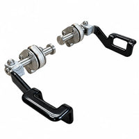 The two deer guard latches at an angle, black handles and the locks on their pins
