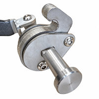 Close-up of the hooked lock plate on a deer guard latch pin