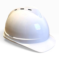 White hard hat viewed from a front-right angle, showing the vents along the top ridge.