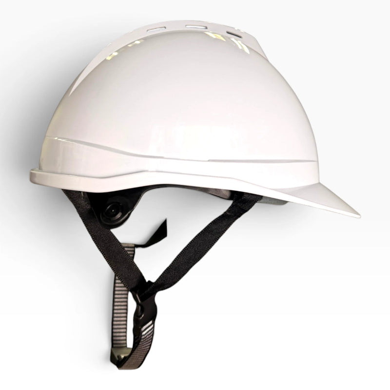 White hard hat seen from the side, with the rear adjustment knob and the chin strap and buckle hanging below the brim.
