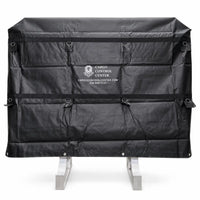Black vinyl headache rack cover installed over the rack frame, front view showing the printed logo and D-ring tie-down points
