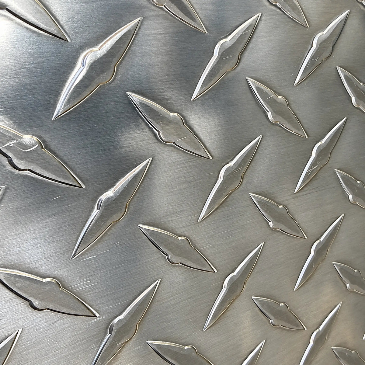 Close-up of the door's diamond plate surface