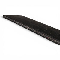 Close-up of the cut edge showing the thickness of the rubber mounting pad