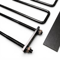 Close-up of the U-bolt threaded ends secured with a mounting plate and nuts