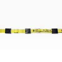 Straight-on view of the yellow webbing printed WLL 3333 LBS with three tread guards clipped on