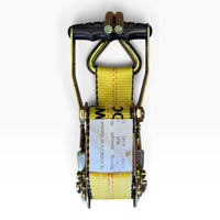 Top view of the closed ratchet with webbing threaded through the spool and the spec label visible.