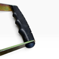 Close-up of the contoured black rubber grip moulded over the ratchet handle bar.