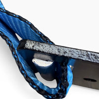 Close-up of the sewn webbing loop wrapped around the flat hook, black stitching visible.