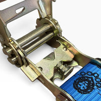 Open ratchet mechanism showing the gold zinc gears, spindle, pawl and release spring.