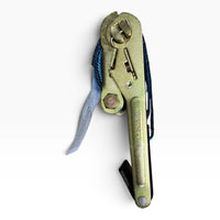 Side view of the closed ratchet, handle stamped LC2500daN, with the warning tag attached.
