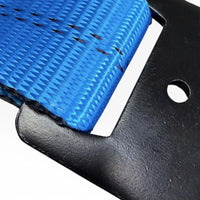 Blue webbing threaded through the slot of the black flat hook, bolt hole beside it.