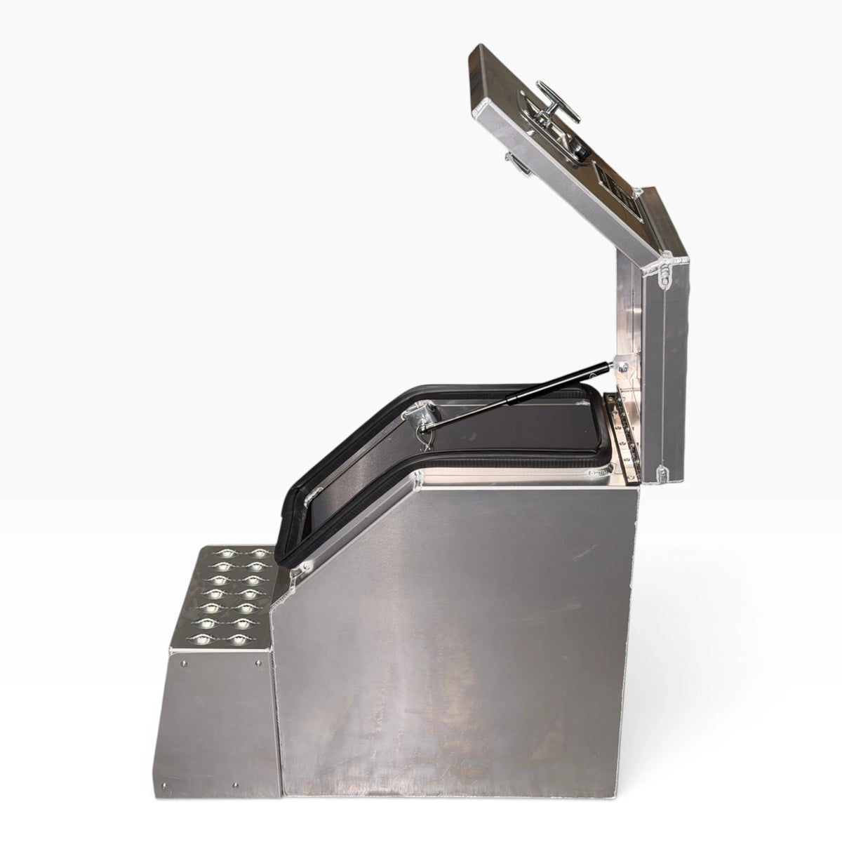 12in saddle tool box from the side with the lid open and the gas strut holding it up
