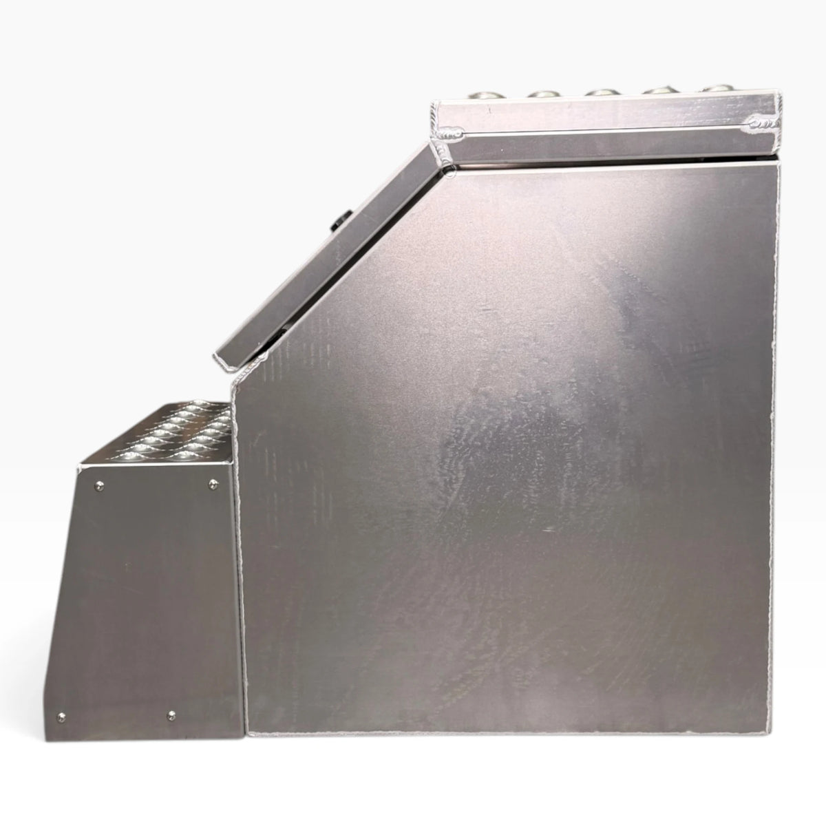 Side profile of the 15in saddle tool box, sloped lid and the bracket carrying the step