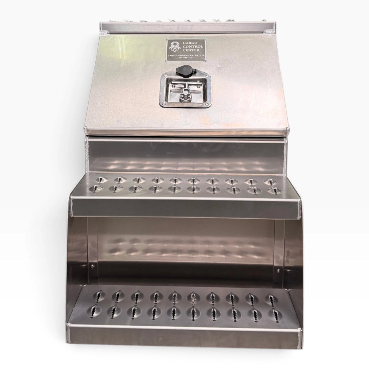 Front of the 18in saddle tool box, brand plate and recessed T-handle latch
