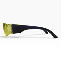 Side profile of yellow-lens safety glasses with the black temple arm extended.