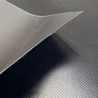 Edge of the patch lifted, showing the cut edge of the material