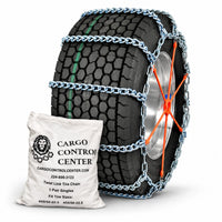 Super single tire chain on a wide single tire, held tight by an orange spider bungee, with the storage bag