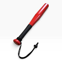 Tire thumper on a diagonal, showing the red knob end and the nylon cord wrist strap with its cord lock