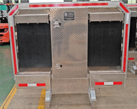 Headache rack assembly with the closed tool box door in the center and matching side compartments, on a lot