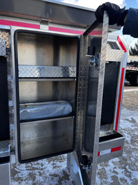 Door swung open showing the empty compartment behind it with two internal shelves