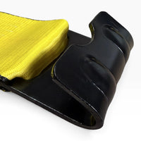 Close-up of the black painted flat hook where it meets the folded yellow webbing.