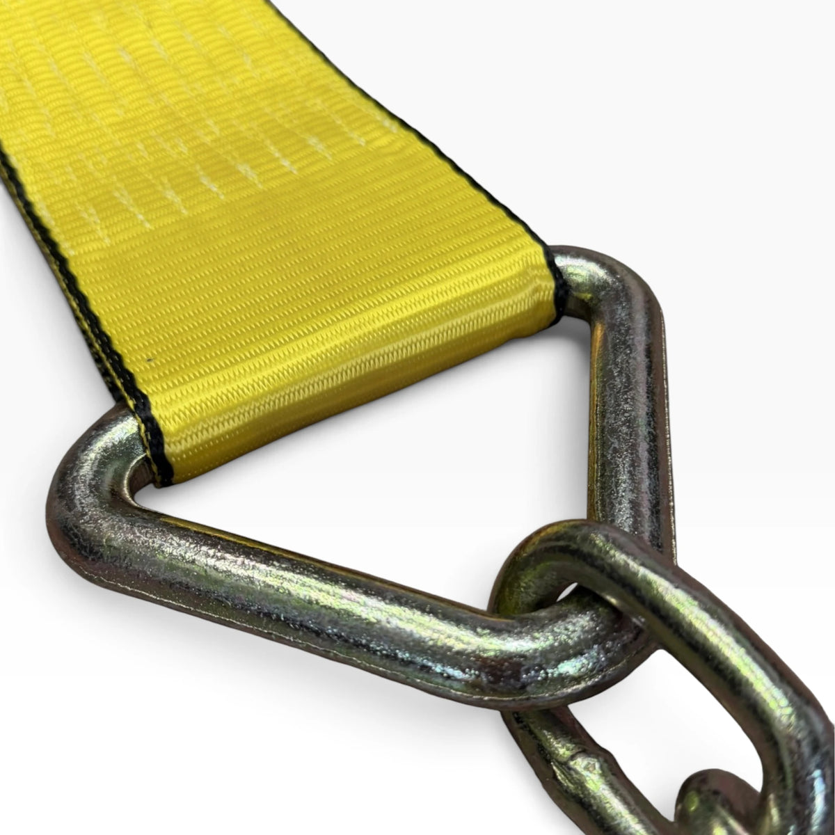 Close-up of the webbing folded through the forged triangle link where the chain attaches