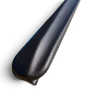 Close-up of the rounded rubber end cap at the tip of the beam wiper blade